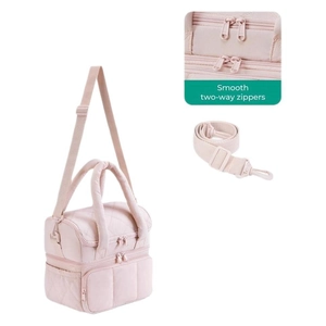Pink quilted insulated lunch bag showing smooth two-way zippers and double layers