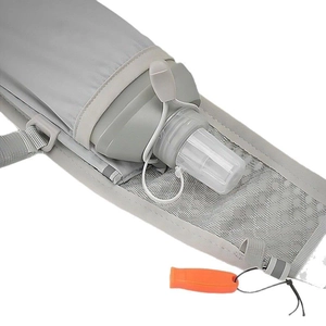 Lightweight grey hydration bladder backpack with orange survival whistle for marathons