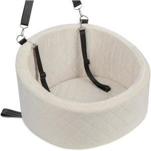 Close-up of beige quilted pet car seat with adjustable safety straps and metal hooks