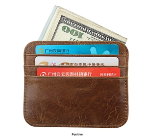Detailed view of brown crazy horse leather card holder with multiple credit card slots