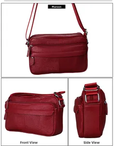 Detail view of dark red leather crossbody bag with multiple zippers and pebble texture