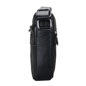 Side view of black leather messenger bag showing thickness and silver metal hardware