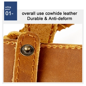 Close-up of premium brown cowhide leather wallet with durable stitching and metal snap button