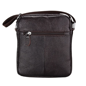 Macro shot of dark brown lychee leather shoulder bag featuring a rear zipper and metal hardware