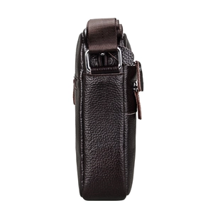 Side view of dark brown leather crossbody bag showing smooth zipper and premium texture