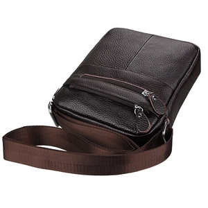 Detail view of dark brown pebbled leather crossbody bag with dual front zippers