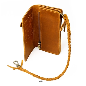 Detailed interior of brown leather wallet featuring multiple card slots and metal zipper