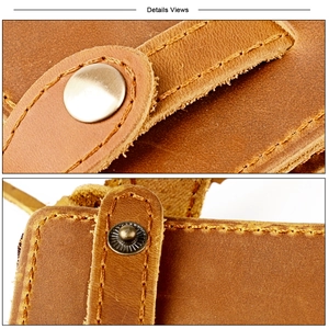 Detail view of premium brown cowhide leather wallet showing precise stitching and snap buttons
