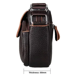Detail view of dark brown pebbled leather crossbody bag showing 80mm thickness and side layers