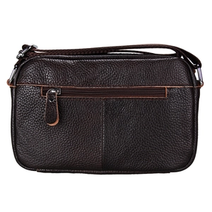 Detail of dark brown lychee leather crossbody bag featuring a secure back zipper pocket