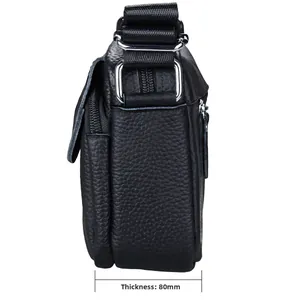 Detail showing the 80mm side thickness and pebble grain leather texture of the black bag