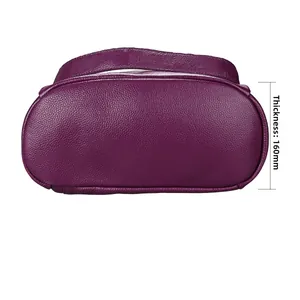 Detail showing 160mm bottom width and litchi texture of the purple leather backpack