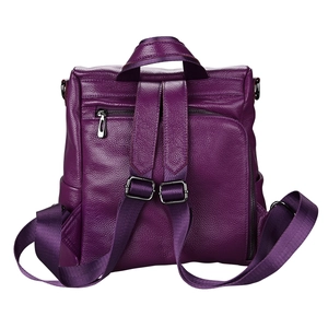 Detail view of purple lychee pattern leather backpack showing back straps and silver zipper