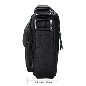 Side view of black genuine leather messenger bag showing 80mm thickness and D-ring detail