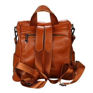 Detailed back view of a caramel brown leather backpack featuring anti-theft zipper pocket