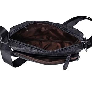 Classic black leather crossbody bag for men with multiple zipper compartments and adjustable strap