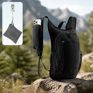 Lightweight foldable black hiking backpack with water-resistant nylon and mesh pockets