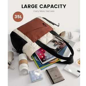 Large capacity quilted tote bag showing 35L storage space for tablets and umbrellas