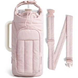 Detailed view of pink quilted water bottle bag with handle and adjustable shoulder strap