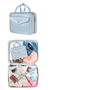 Waterproof light blue toiletry travel bag with front pocket shown inside a suitcase