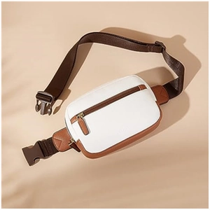 Detail view of the contrast color PU leather waist bag with adjustable strap and front pocket