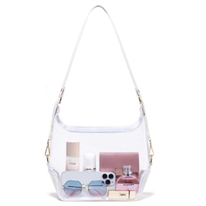 Transparent PVC tote bag with white leather straps showing large capacity for essentials