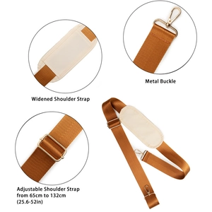 Adjustable caramel nylon shoulder strap with gold metal buckles and comfort pad