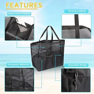 Grand sac de plage en maille noire avec coutures renforcées et poches multiples