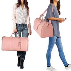 Pink large capacity foldable travel duffel bag with shoulder strap and tassels