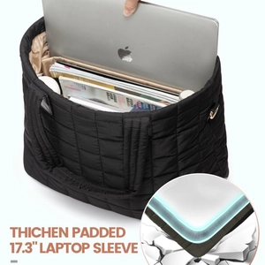 Quilted black tote bag with a padded compartment for 17.3 inch laptop storage