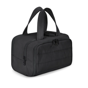 Large black quilted toiletry bag with wide opening and sturdy top handles for travel