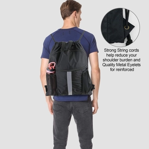 Detail view of sports drawstring bag with reflective strip and mesh water bottle pocket