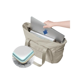 Quilted beige tote bag with laptop compartment and padded shockproof corners for gym or work