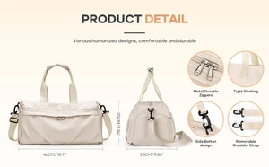 Detailed close-up of a beige waterproof gym bag showing zippers and reinforced stitching