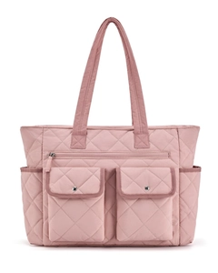Quilted pink travel tote detail showing front zipper and snap button pockets