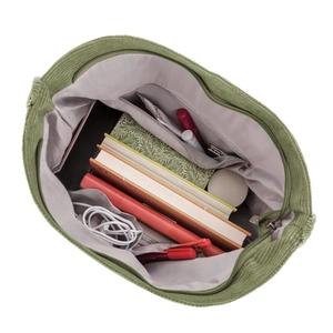 Green corduroy tote bag with large capacity interior and zipper pocket in a minimalist design