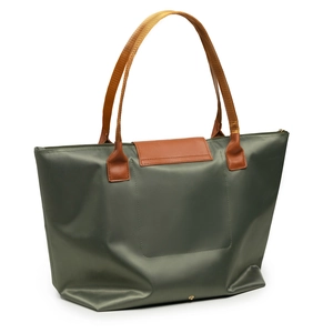 Detailed view of army green nylon tote bag with leather handles and top zipper closure