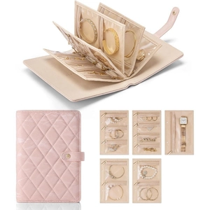 Organizer per gioielli in pelle rosa trapuntata con scomparti trasparenti a cerniera