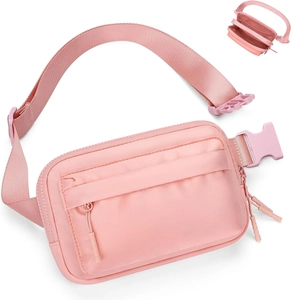 Detailed interior storage view of a pink nylon mini belt bag with dual-compartment structure