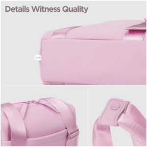 Pink waterproof travel gym bag with double zippers and reinforced woven handles