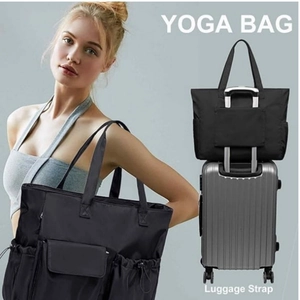 Waterproof large capacity yoga beach bag with luggage strap shown in lifestyle use