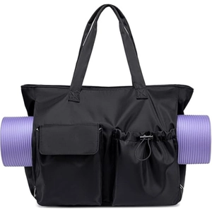 Waterproof black beach bag with yoga mat holder and multi-pocket functional design
