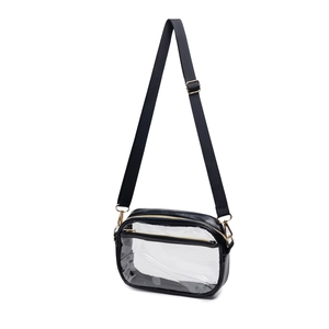 Detail of transparent PVC crossbody bag with black trim and adjustable shoulder strap