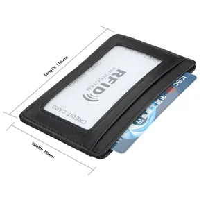 Slim RFID-blocking leather card holder detail with clear ID window and fine stitching