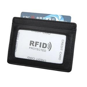 Detail of black grain leather card holder with RFID protection and transparent ID window