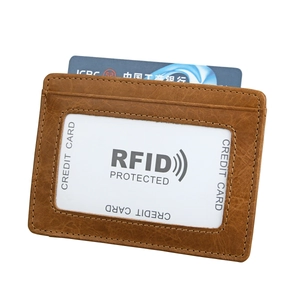 Detail of RFID protection window in brown litchi pattern leather business card holder