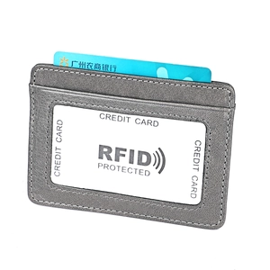 Detail view of grey leather RFID wallet with card slot and transparent ID window