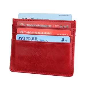 Close-up of red lychee grain leather RFID card holder with four horizontal card slots