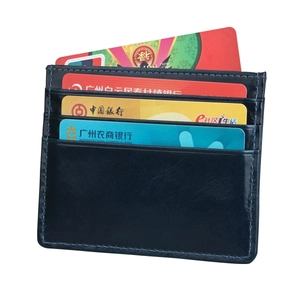 Detail view of genuine leather RFID card holder with neat stitching and multiple slots