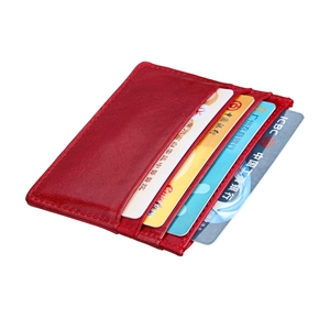 Slim red leather RFID card holder with four slots for credit and business cards